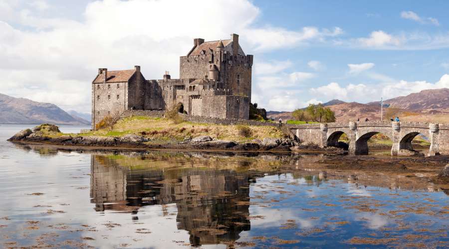 Panorama Reflection of Eilean Donan Castle, Highland Scotland.