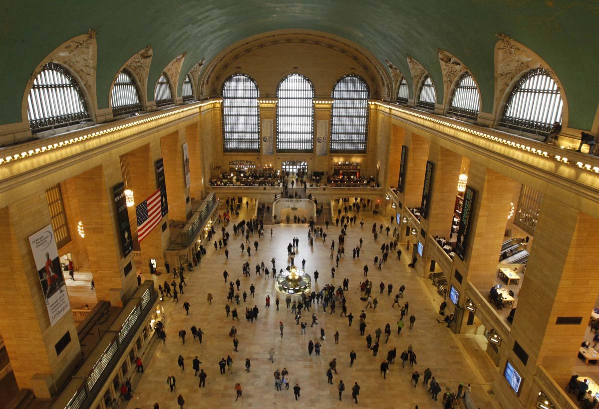 Commuters move through the grand hall of Grand Central Terminal in New York