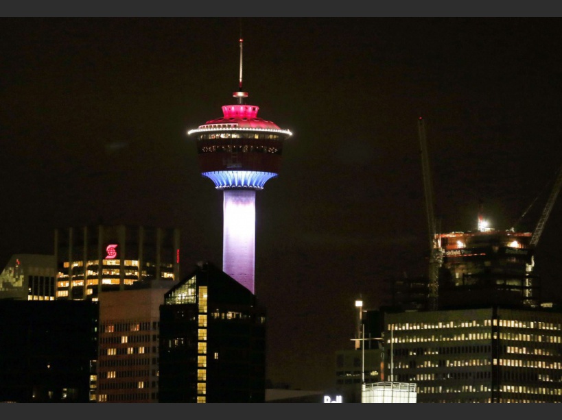 The Calgary Tower was lit up with the colors of the French flag to show support and sympathy regarding the Paris attacks in Calgary, Alberta on Friday, Nov. 13, 2015. (Larry MacDougal/The Canadian Press via AP)/LMD101/94800388549/MANDATORY CREDIT/1511140555